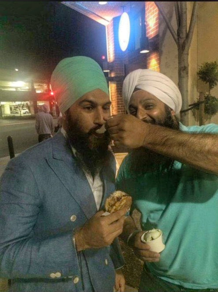 Canada's NDP party leader Jagmeet Singh is being spoon fed ice cream by Parvkar Sigh Dulai who was put on the no-fly list in 2018 by Canadian Security and Intelligence Services for allegedly being a 'suspect to being a facilitator of terrorist-related activities' (Khalistani).