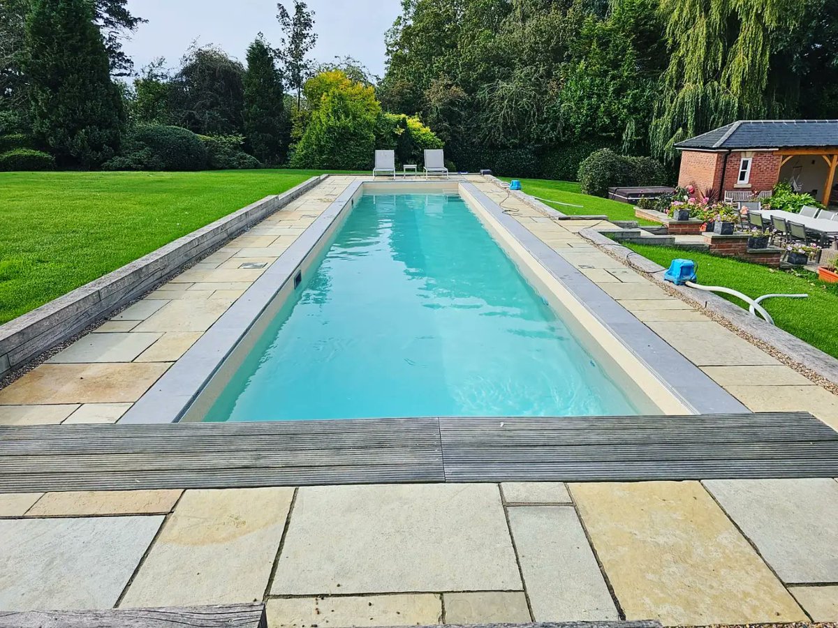 Are you still holding out on closing down your pool for the winter? With a few more days of clear skies you can still make the most of your outdoor pool like this pool we built in Bedfordshire. #bluecubepools #swim #swimlife #outdoorliving #poolside #pooltime #gardeninspiration