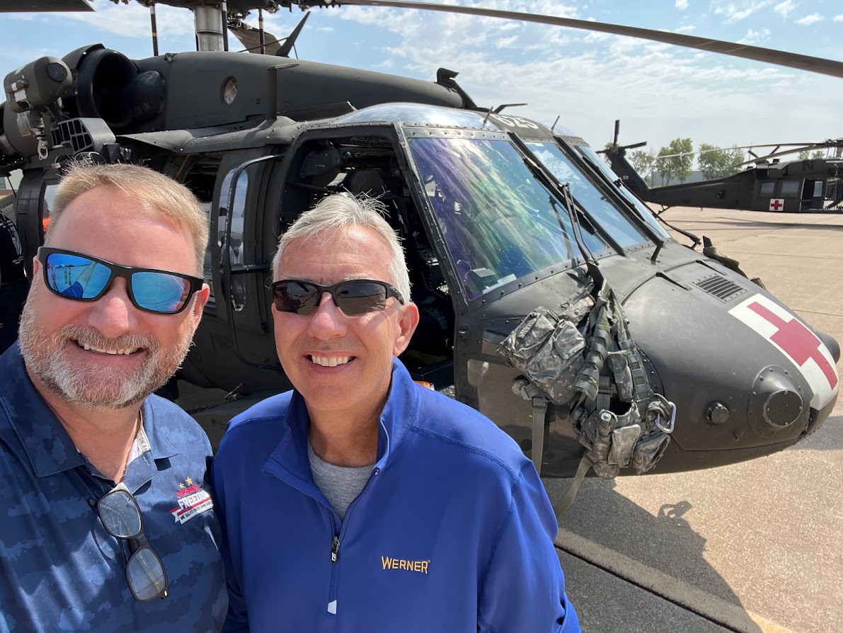 DriveWerner's tweet photo. EVP and CAO Jim Schelble and VP of Field and Government Recruiting, Greg Hamm got to enjoy a ride in the UH-60 Black Hawk helicopter around Lincoln, NE with G Co 2-104th GSAB. As proud supporters of the National Guard, we are honored for this experience! 🚁 #MilitaryMonday https://t.co/BQ3OtK5I5I