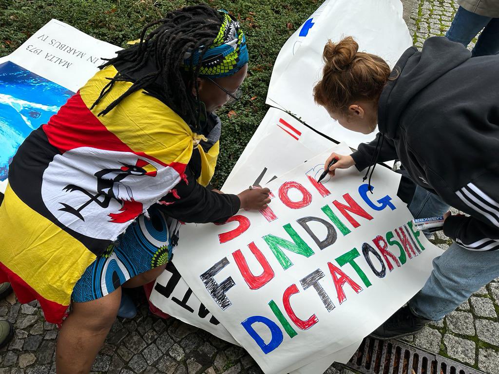 drstellanyanzi's tweet photo. 5/10 The peaceful protest at @BMZ_Bund has called on Germany to stop funding dictatorship in Uganda!
#ugnotyetindependent
#stillnotindependent https://t.co/DuG1fJNTHj