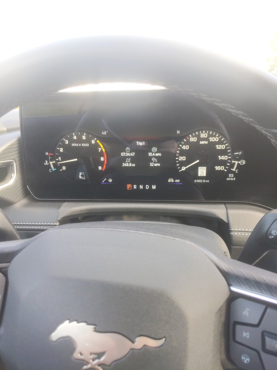 GregMigliore's tweet photo. Pretending I'm in a Fox Body in the 2024 Ford Mustang. @therealautoblog #techoftheyear https://t.co/Or9WY8zDOt