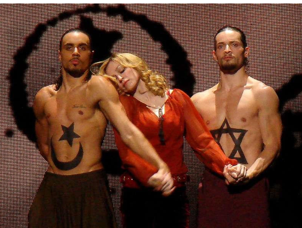 MadonnaUltimate's tweet photo. Madonna represents the ideal world we all want to live in. By all, I mean not the bigots . Not the fascists. Not the haters. These people don't belong in our world so they fight Madonna's values. They don't want her and us to live. #Israel #Palaistine #IStandWithLove https://t.co/b46mQhFouU