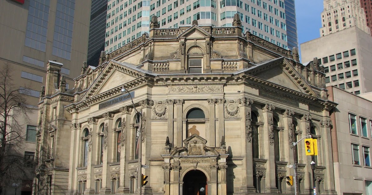 CraigBaird's tweet photo. It is October and each day I am sharing a story of a haunted place or building in Canada.

Today, I am looking at the Hockey Hall of Fame building!
Located in Toronto, the Hall of Fame sits in a historic Bank of Montreal building and that building has some history to it.

The building was built in 1888 and operated as a branch of the Bank of Montreal until 1993 when it became home to The Hockey Hall of Fame.

During its history as a bank branch, a robbery occurred on March 11, 1953. In that robbery, 19-year-old Dorothy Mae Elliot was shot. She died the next day. 

Dorothy has never seemed to have left the building she worked in. 

According to staff at the Hockey Hall of Fame, a woman in an old-fashioned dress appears near the offices and vault. Lights also go on and off by themselves, and doors open and close. Various cold spots have also been reported in the building.

She typically haunts near the vault area, and can be seen looking down from the second storey of the building according to staff. 

If you enjoy my Canadian history content, you can support Canadian History Ehx with a donation at https://t.co/u12Dmz8vKv

Sources:
https://t.co/bgpRMmK1Iq
https://t.co/HvuCSEd8oM