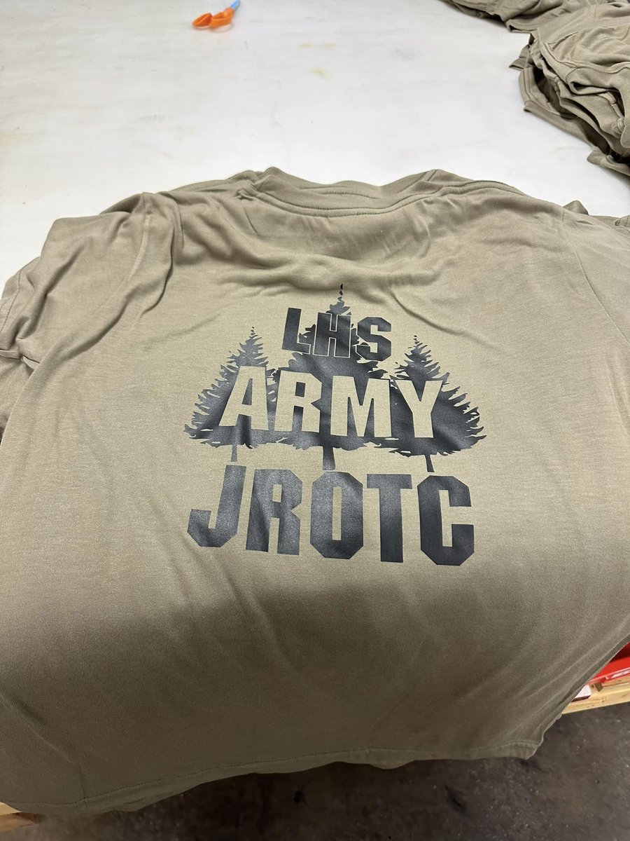 Mr. Hower’s Graphics Seminar students working on shirts for JROTC. #cedarpride