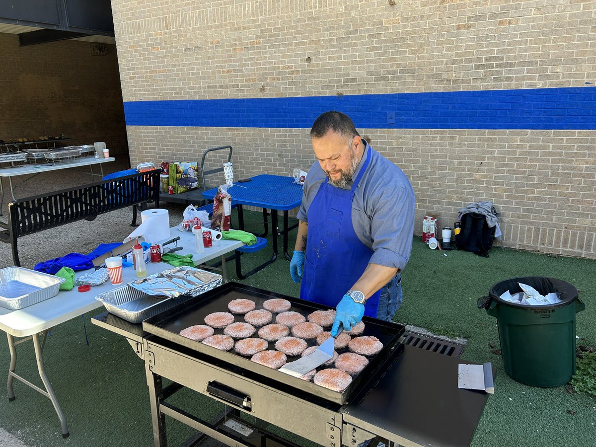 AHSTrojansAISD's tweet photo. What do you all do when you have four hours of PSAT and SPED training? How about a cookout with admin serving the teachers? Good times, good food, good people! @Secondary_AISD #OneAnderson https://t.co/VJ7lggWncK