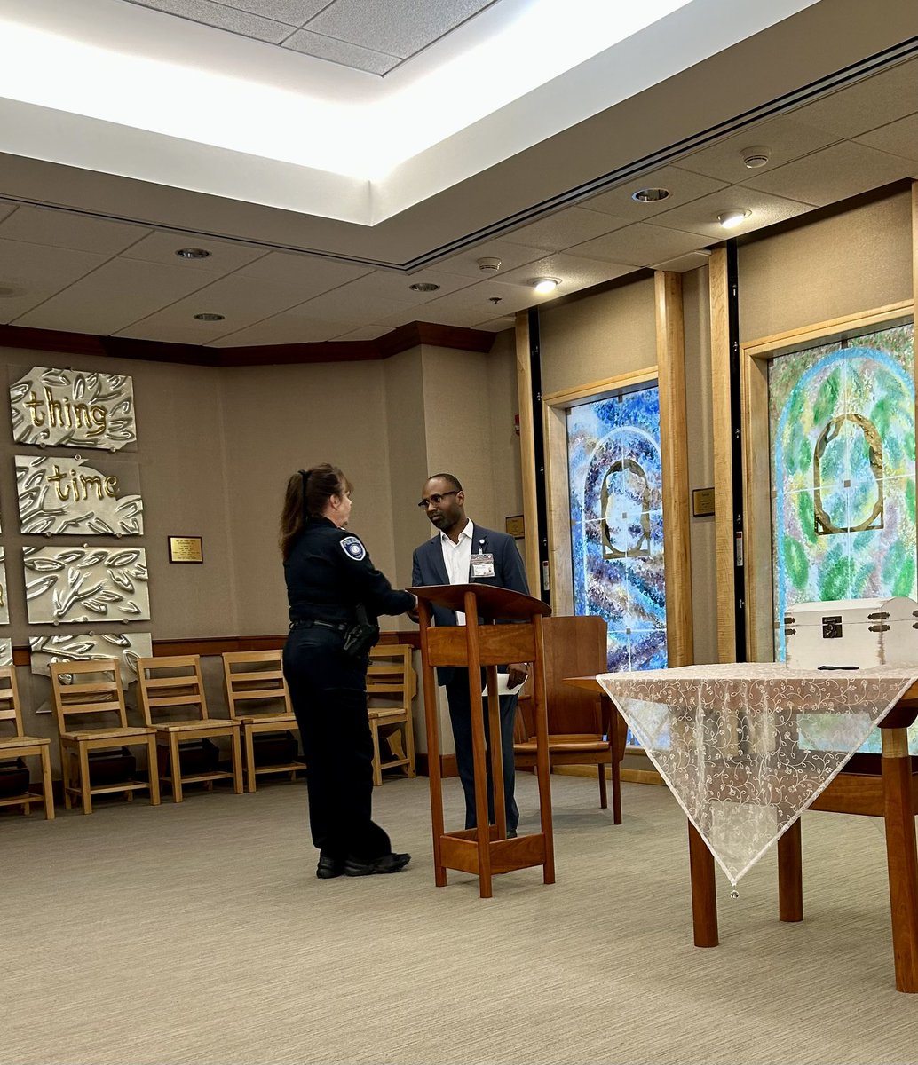 UMMCPolice's tweet photo. UMMC PD gathered today following #FaithandBlueWeekend along with Chaplain Gilbert and our clinical partners for a moment of reflection and unity. Together, we are a force for positive change. 💙 #CommunityStrong  #PrayersforUnity https://t.co/vxBCfd1yxM