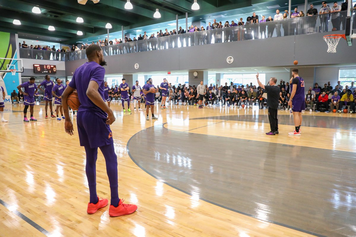 Mishbia15's tweet photo. Was awesome having my two worlds come together, as the @Suns were in Detroit for our first pre-season game yesterday and stopped by @UWMlending today as well. It was such a special day to have our Suns team walk around campus and play in front of hundreds of UWM team members on our basketball court, while thousands of team members watched the livestream on our TVs.