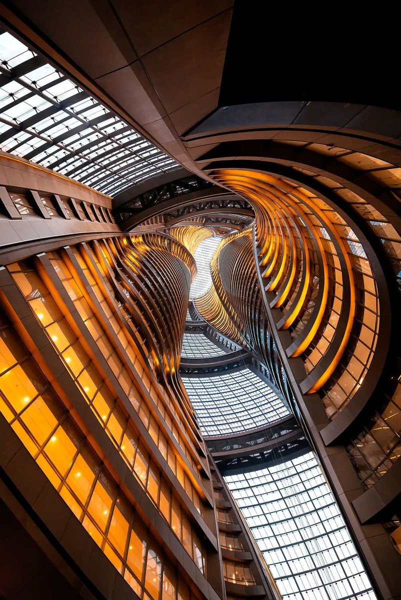 CscecM's tweet image. Leeza SOHO in #Beijing&apos;s Lize Financial Business District, constructed by #CSCEC, features a unique &quot;double helix&quot; design with two twisting towers. It houses the world&apos;s tallest atrium, combining innovation and beauty in an awe-inspiring structure.