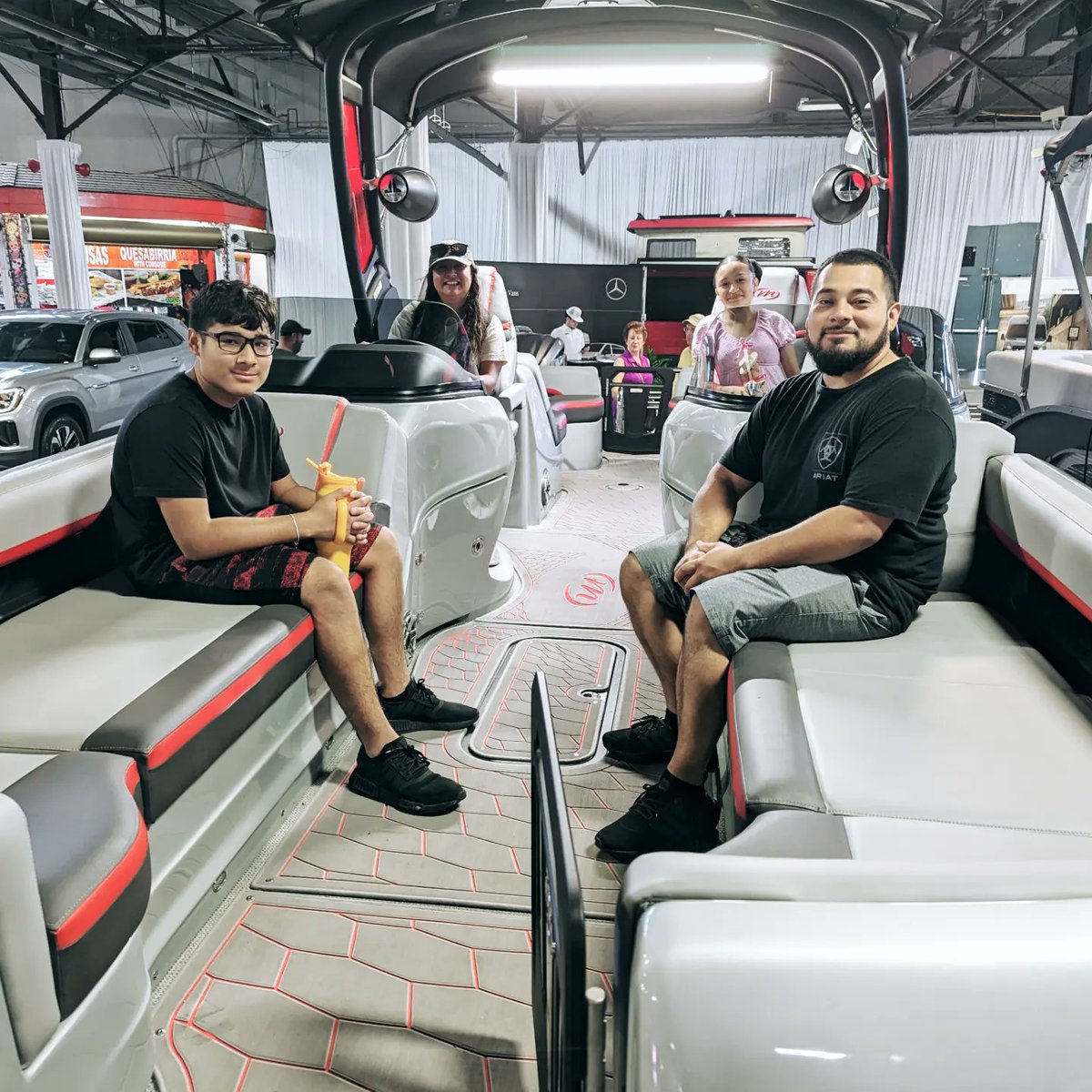 texasautoshow's tweet photo. The Reynoso family from Dallas enjoyed the @blkbeardmarine boats and you can too! Check them out in the Centennial Building at the State Fair of Texas. #BigTex #TXautoshow https://t.co/uN2CMp5US6