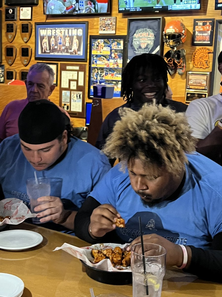 WeAreLely's tweet photo. A huge thank you for Foxboro Sports Tavern for hosting Lely and Naples football teams tonight in preparation for the 50th Coconut Bowl. Thank you for your continue support!! All in good fun, a wing eating contest between the two teams. https://t.co/9qoq1kmz0H