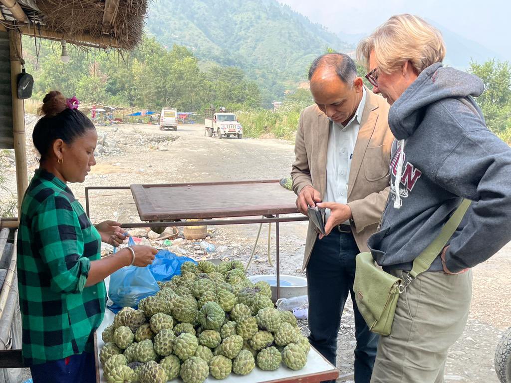 EUAmbNepal's tweet photo. First time (of many) on the road in 🇳🇵, testing farm to fork with custard apples in Kavre 🙌 https://t.co/TDXz7Xp4xQ