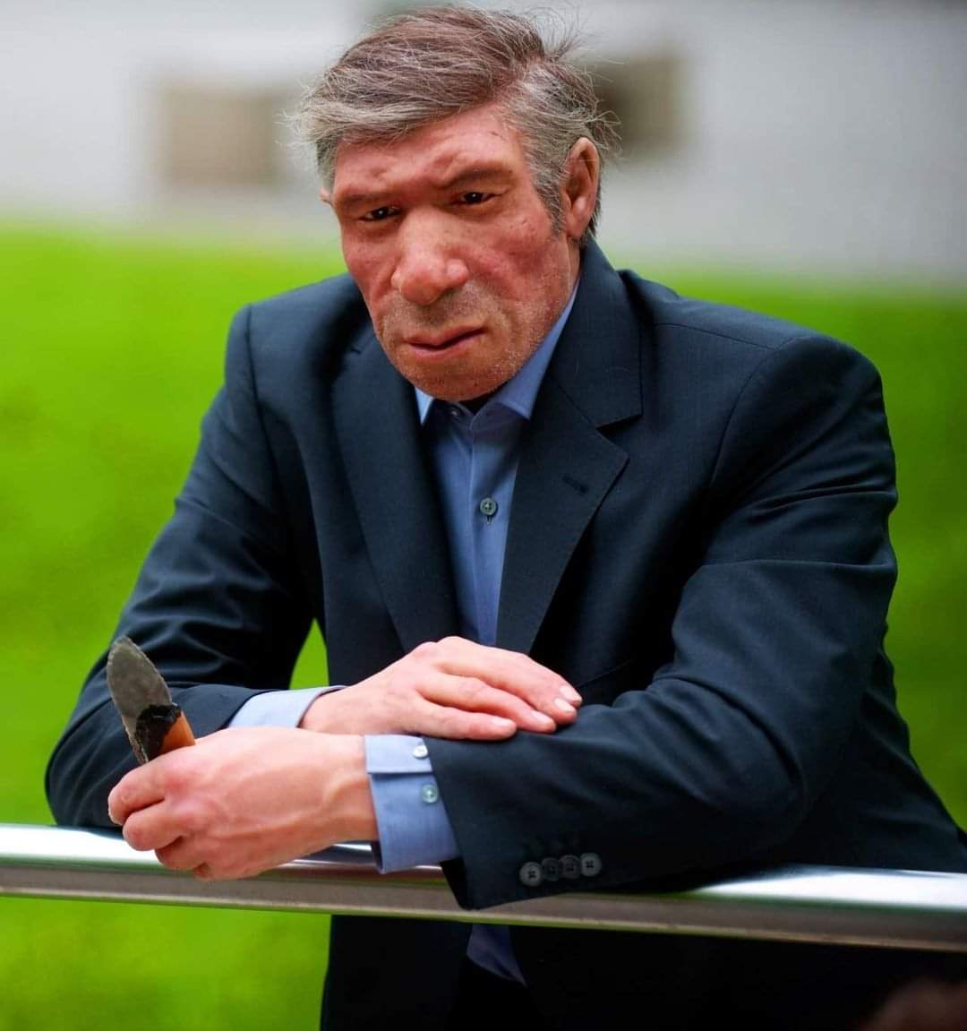 A reconstruction model of a 'Neanderthal Man' in modern clothing; stands in front of Neanderthal Museum in Mettmann, Germany. He's leaning on the railing in the exhibit as if he was a normal visitor taking a break.

Neanderthals are an extinct species or subspecies of archaic