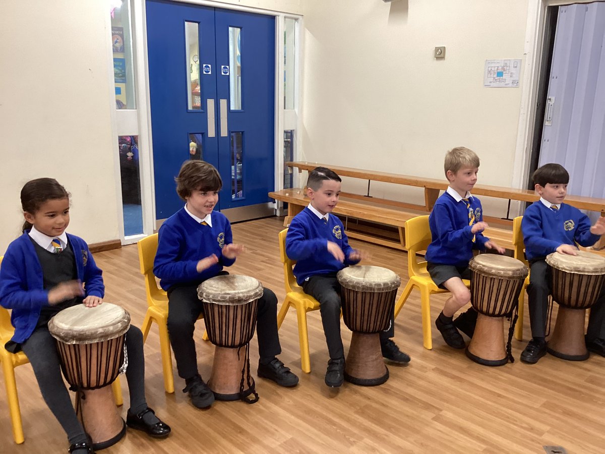 JamesBrindleyPS's tweet photo. As part of their topic on Africa, Year 2 have welcomed @Drumroots into school this morning for some African dance and drumming sessions. First up, learning how to play the djembe drums #slapandtone #bangthatdrum https://t.co/H8MutXuqa9