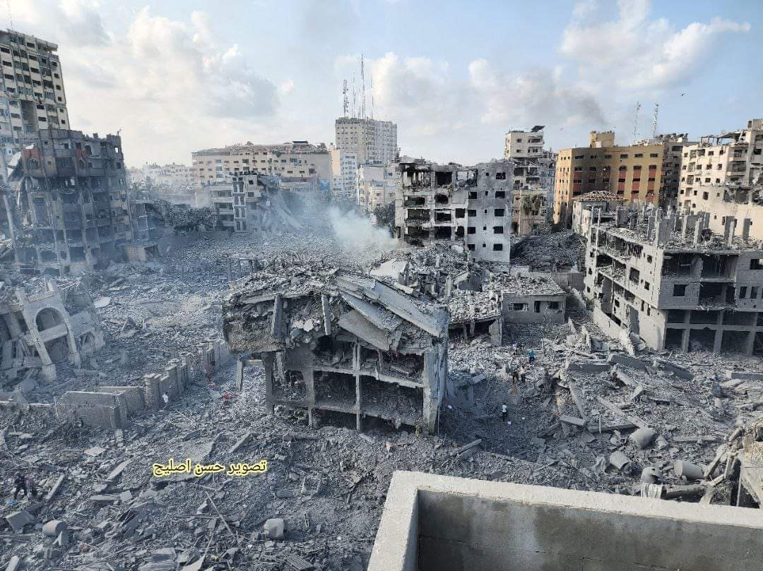 AyaAlGhazzawi's tweet photo. AlRimal neighborhood, one of the key milestones Gaza is known for and one of the most crowded areas with people, commercial shops and educational institutions, has been leveled to the ground by Israeli warplanes. 

#GazaUnderAttack 
#FreePalestine https://t.co/ZqAktbNz4n
