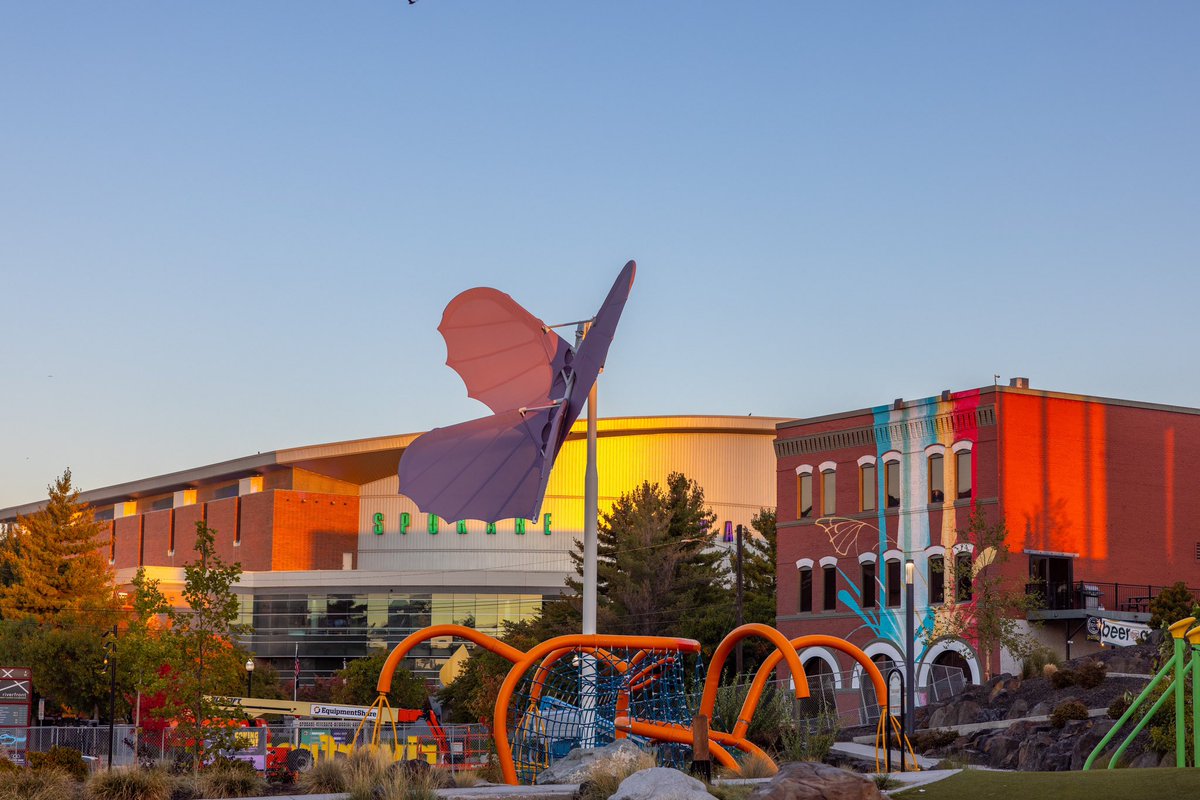 The purple butterfly is BAAACK! 🦋 Had an opportunity to drop by at sunrise. Love the light from the sun casting on the finer points of the park! The Papillon Building is awesome! Spokane is awesome! <a href="/RiverfrontSpo/">Riverfront Spokane</a> is awesome!

Haha…Whadya think?

#Spokane #cityscape  👀