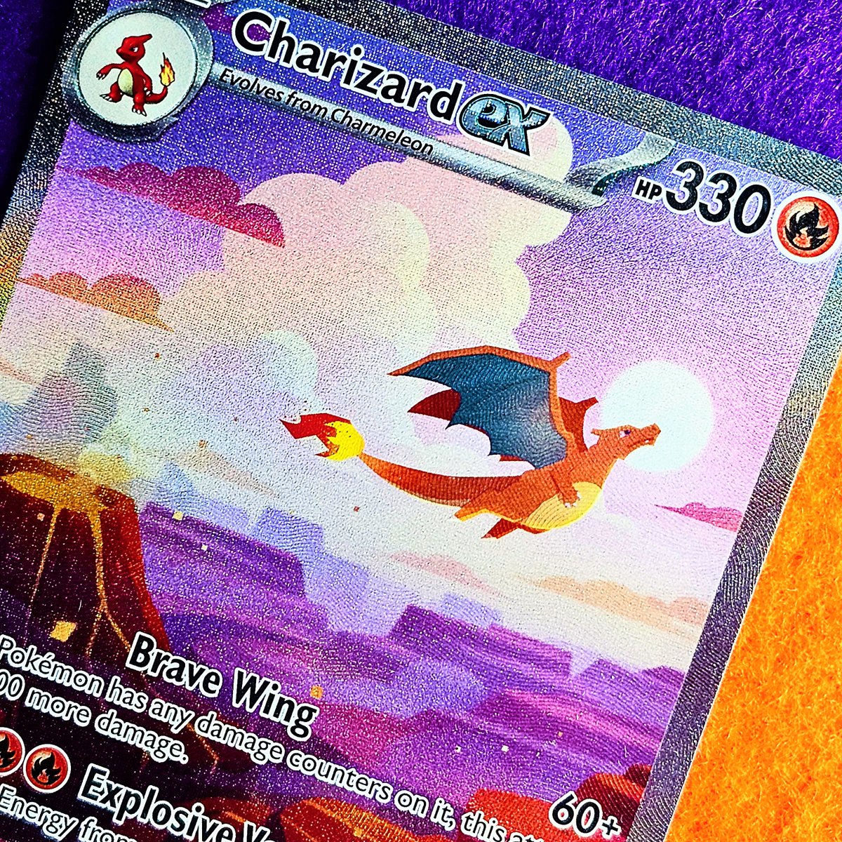 PokemonTCGUK's tweet photo. Without looking it up first, how high do you think a Charizard can fly? 🤔 https://t.co/f0ngW2TaaL