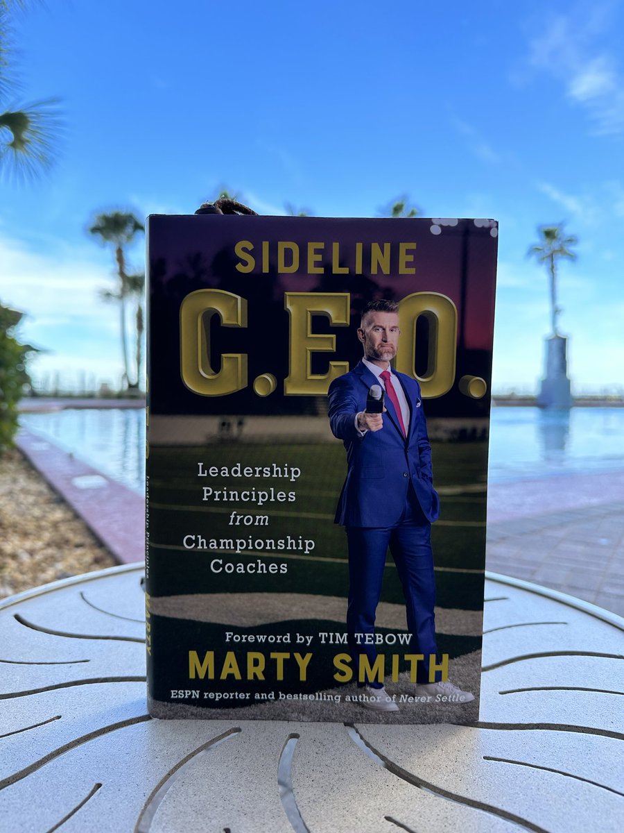 Poolside reading at PCB!!  <a href="/MartySmithESPN/">Marty Smith</a>