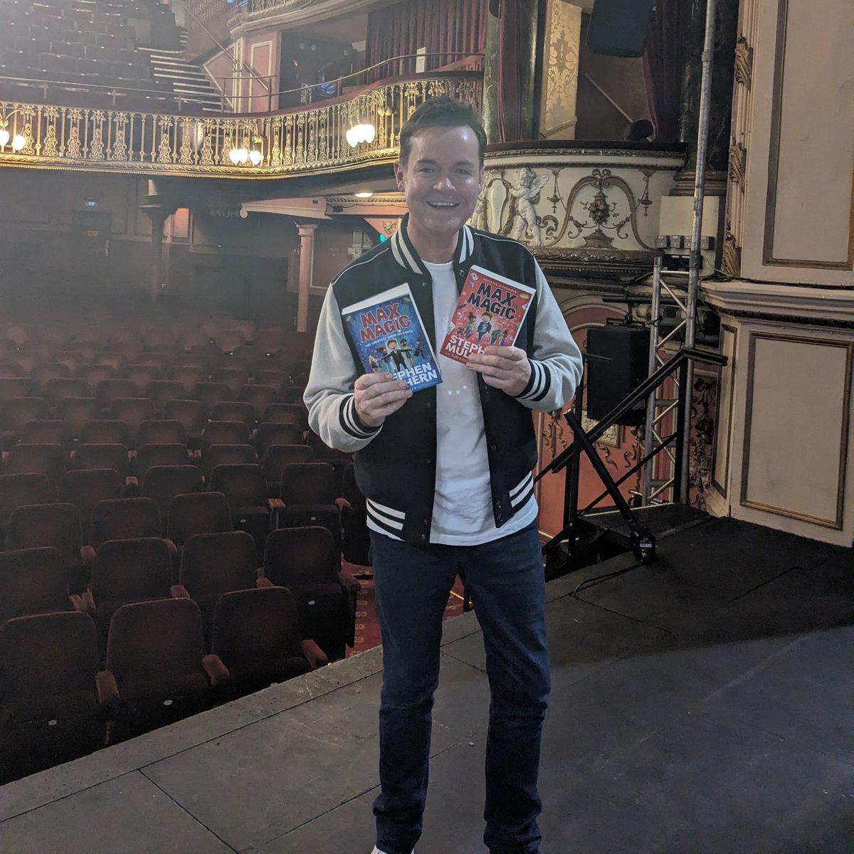 piccadillypress's tweet photo. We’ve had a lovely day with @StephenMulhern at the absolutely packed out @NewWimbTheatre for @Wimbookfest today. Hundreds of budding magicians from 15 schools joined us, taking part in magic tricks and talking about following their dreams! #MaxMagic2 https://t.co/ZJymD6urae