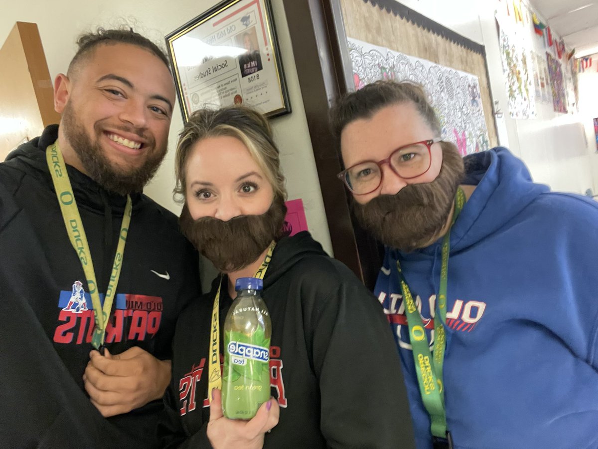 TeachMrsF's tweet photo. @OMSocialStudies always pulls through for a theme. Celebrating Coach Fulton’s bday for “Two or More” Tuesday! @OldMillHSAACPS . #spiritweek #imitationisflattery #fullfulton #beards #manbun #oregonducks #omhsgear #greentea https://t.co/4oX3rVBukg
