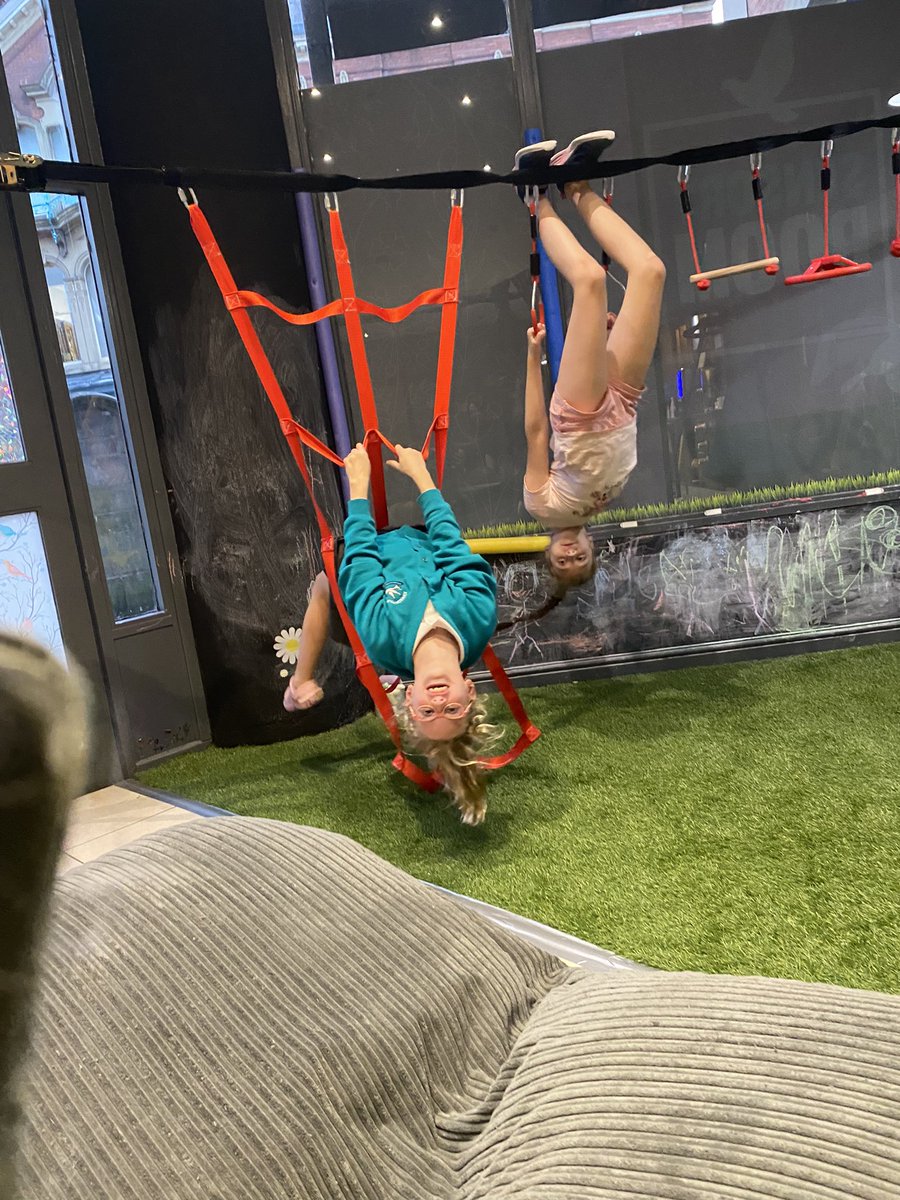 Sometimes the answer is “hang upside down”. Sensory room fun.