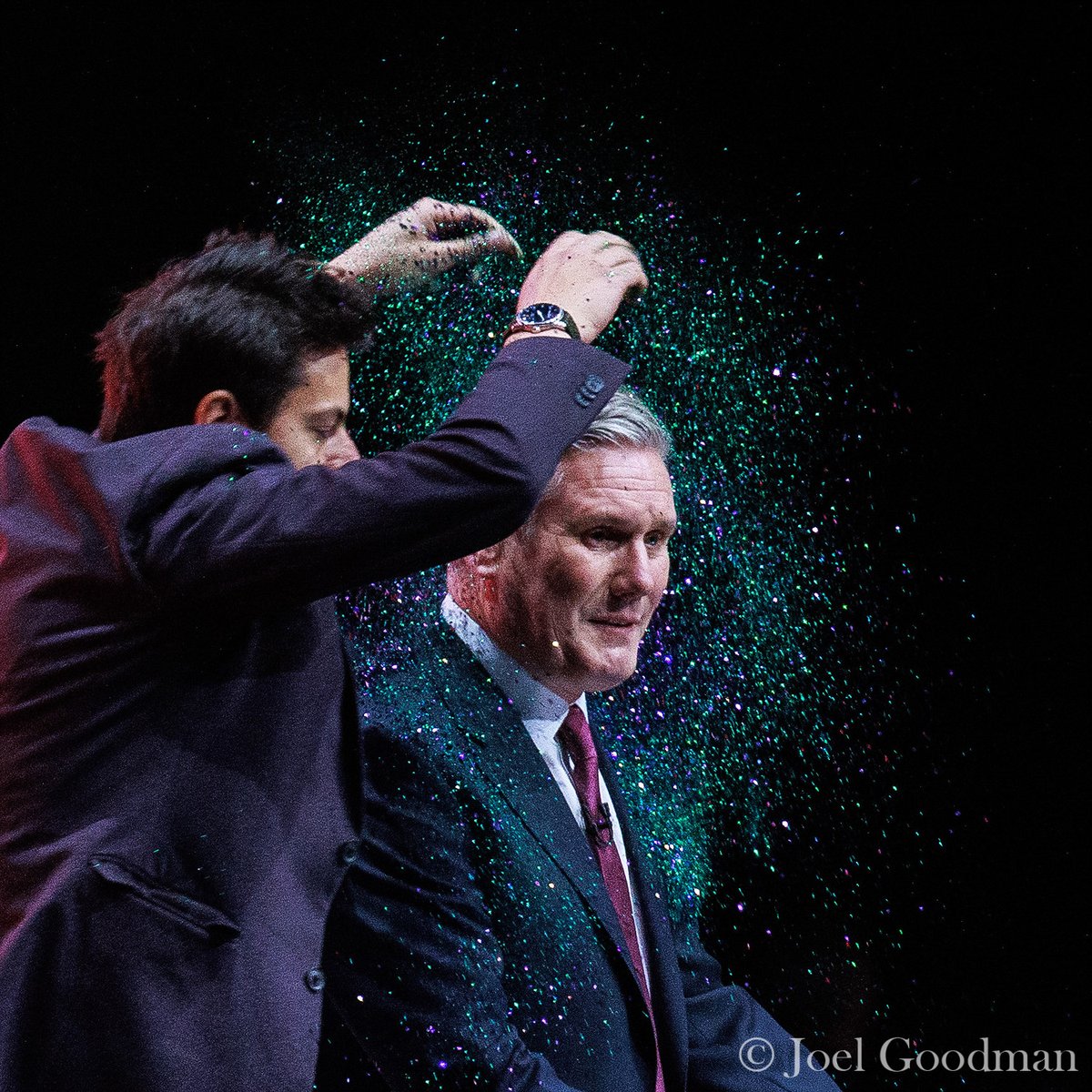 10/10/2023: A protester invades the stage and pours glitter over Keir Starmer at the start of the Leader's Speech at the Labour Party Conference in Liverpool.