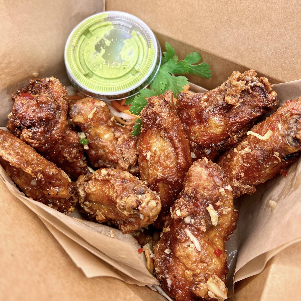 A fan favorite: MBM Vietnamese Fish Sauce Wings with a side of our signature sauce 😍 Order yours today until Friday 10:30 AM to 2 PM (‼️We are closed this Saturday 10/14)