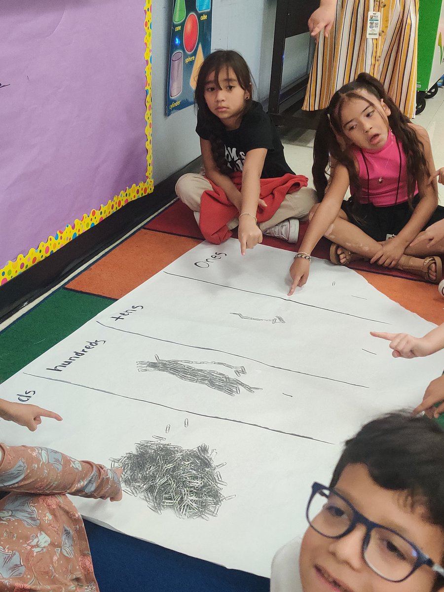 hixsecondgrade's tweet image. How many paper clips?  Using paper clips represent place value @mizstr84ward  @LundquistJess  @MarkGarcia0569 @NISDCarlosCoon