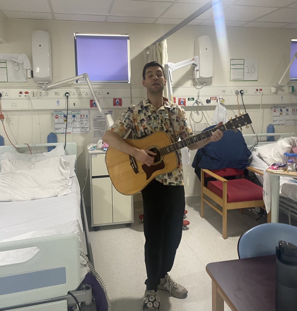 In Frimley Park hospital today…. Meet Nick our new music therapist. He was playing his guitar and singing beautifully on the wards. He was engaging some of our patients with Dementia. What a lovely atmosphere… 👍🏽👋😊💕I felt like joining in but I was doing my day job.😂