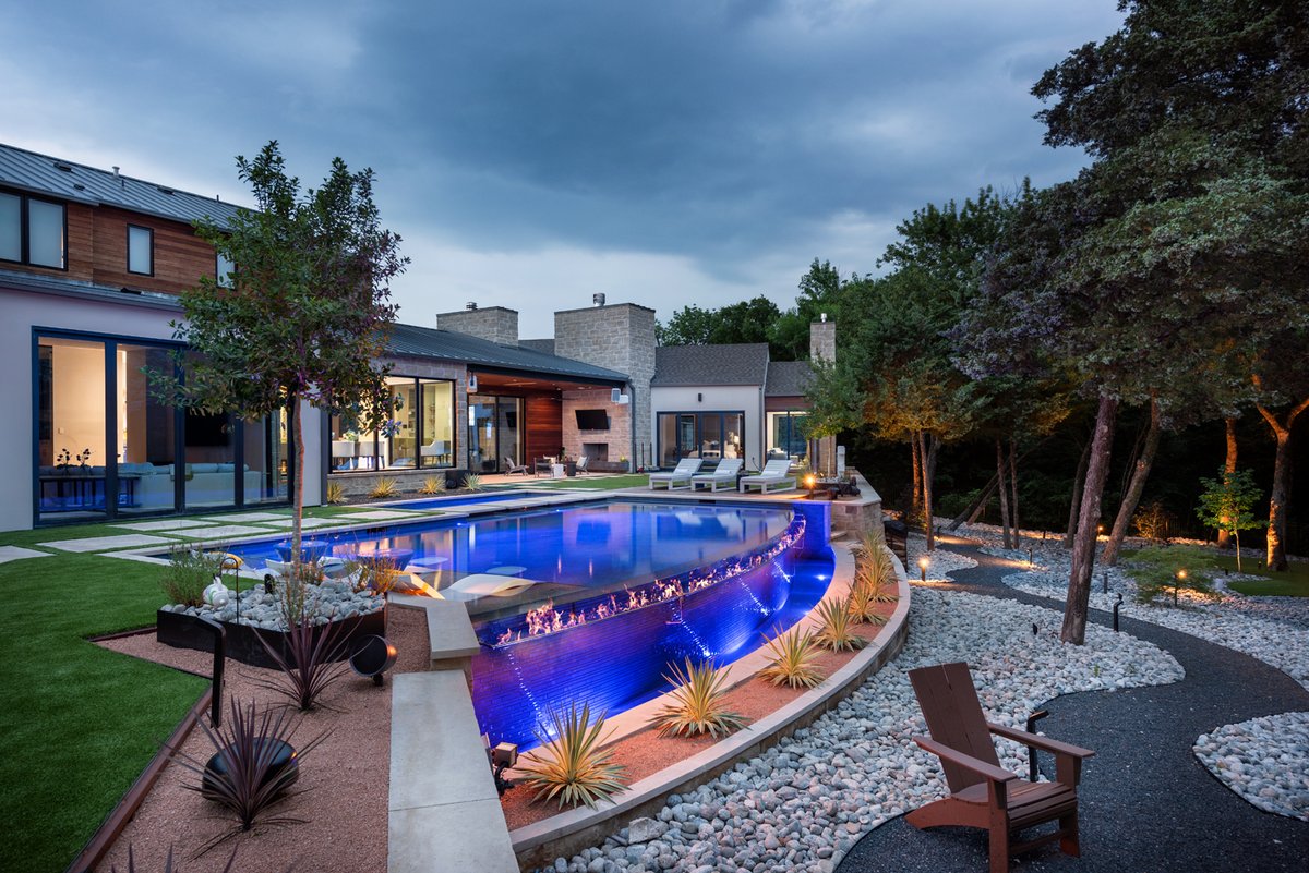 AquaTerraDesign's tweet photo. Everything about this backyard is perfect, but what really makes this space unique is the 37-foot fire bar 🔥 lined along the pool's edge.💧It’s a feature that brings fire and water together (or as close as they can get 😉)! https://t.co/04jUBT1atp