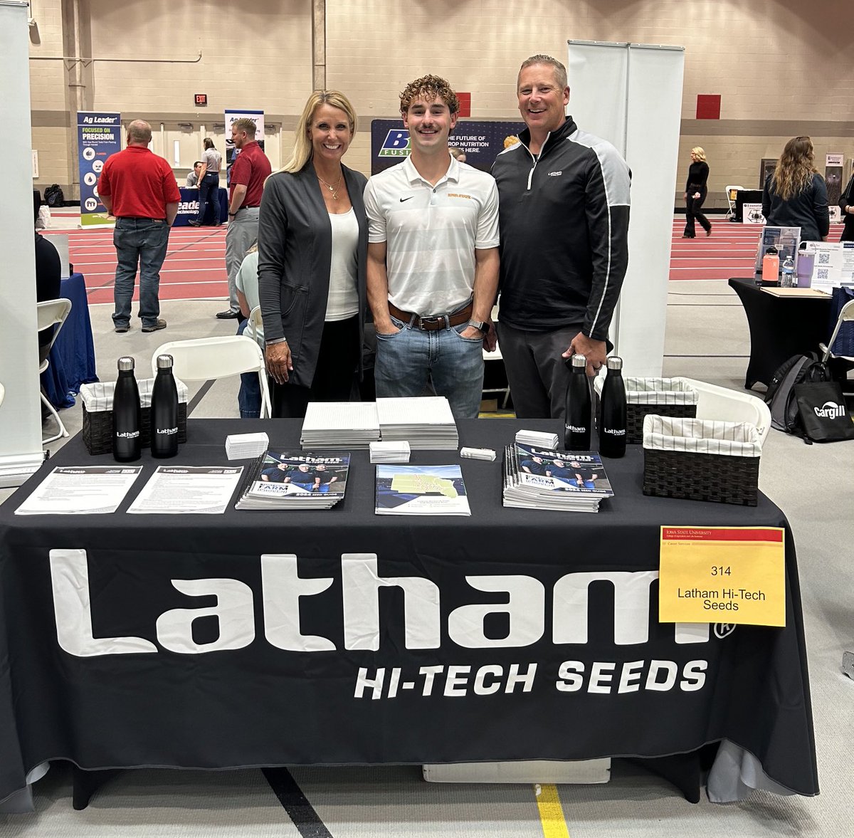 Shannon_Latham's tweet photo. It’s @iastate_cals annual Ag Career Day and @LathamSeeds is well represented! Glad to see my son met up with his former internship supervisors. We’re always looking for seed reps. #FamilyOwned #FarmProven #LathamSeeds https://t.co/KoDD5ZNvxH