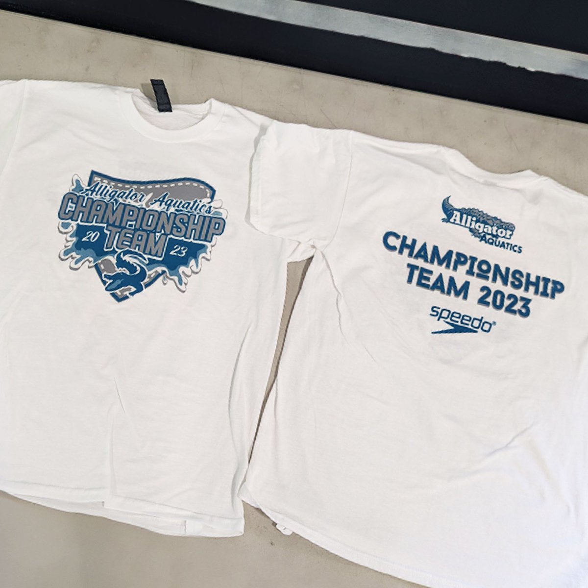 MelonInk's tweet photo. Throwback to these cool championship shirts we printed for Alligator Aquatics this past summer! 🐊🏊 https://t.co/4NYfNSBN5T