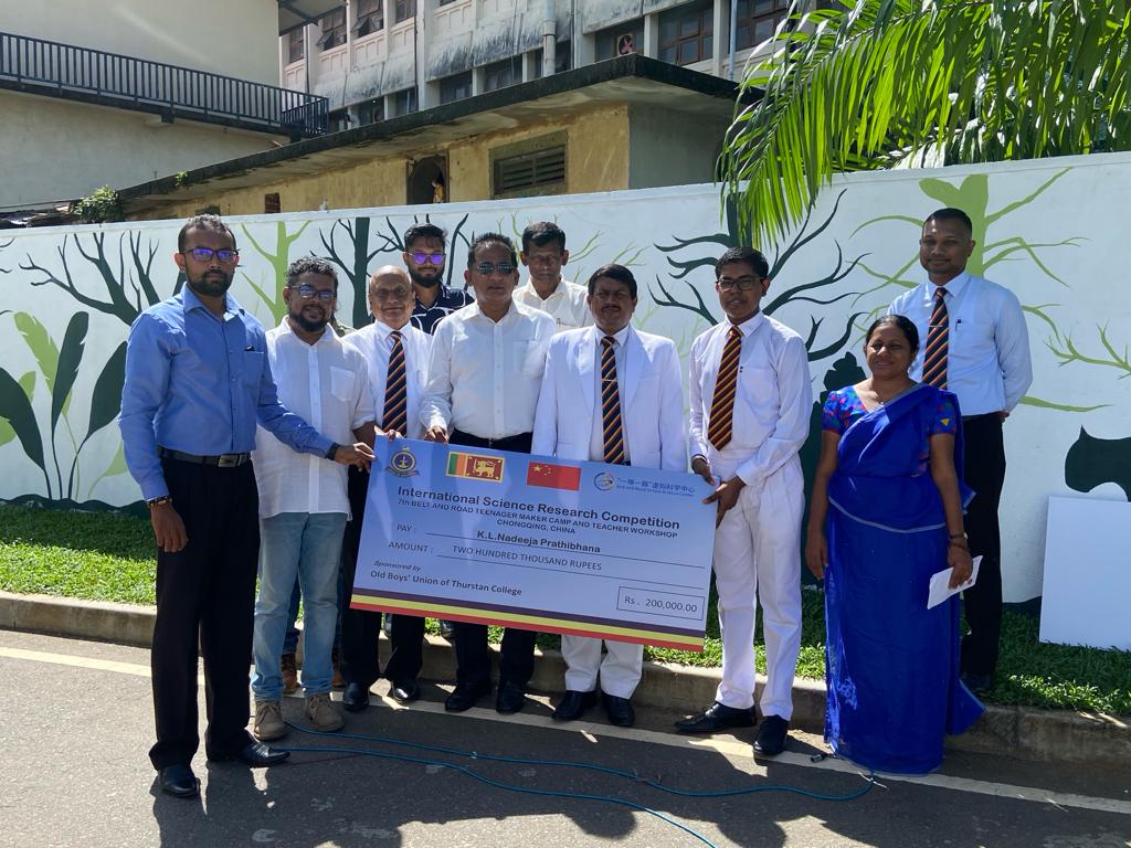 CollegeThurstan's tweet photo. The OBU is honored to sponsor the airfare for young Thurstanite Nadeeja Prathibhana and esteemed Science teacher Mrs. D. P. U. D Abeysekara. https://t.co/H1HrUe4cyP