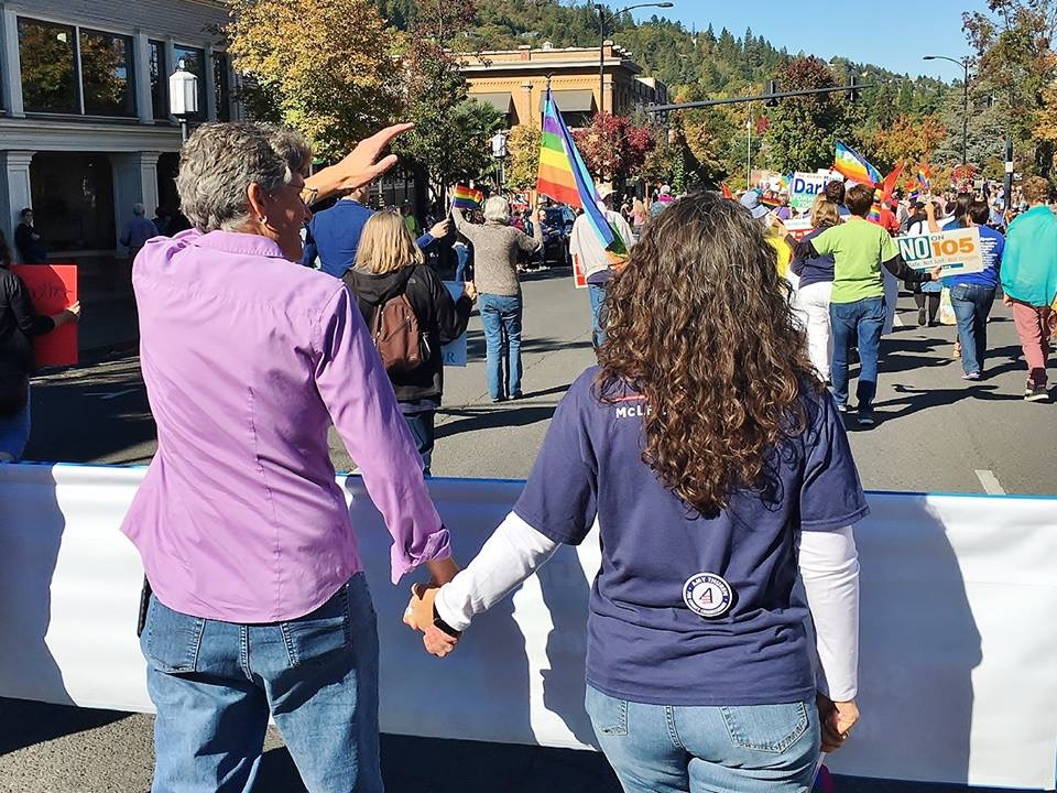 JamieforOregon's tweet photo. On this National Coming Out Day, I'm proud to be an out lesbian, esp. given the direct &amp; indirect attacks on our community.

That's why @EqualityPac is so important &amp; strongly supporting my candidacy, so we have more LGBTQ+ Members of Congress fighting for our fundamental rights. https://t.co/A0YwUOvPE9