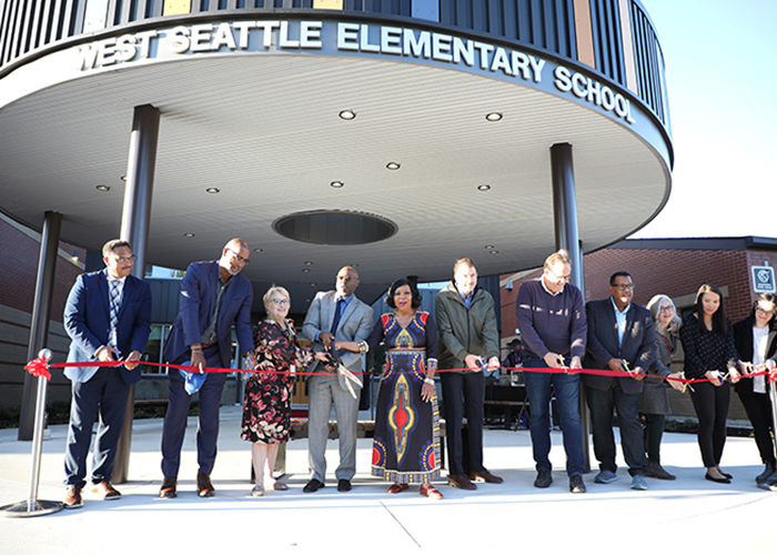 writeasrain's tweet image. Ribbon cutting ceremony last month under the new entry canopy at the renovated and expanded West Seattle Elementary School.