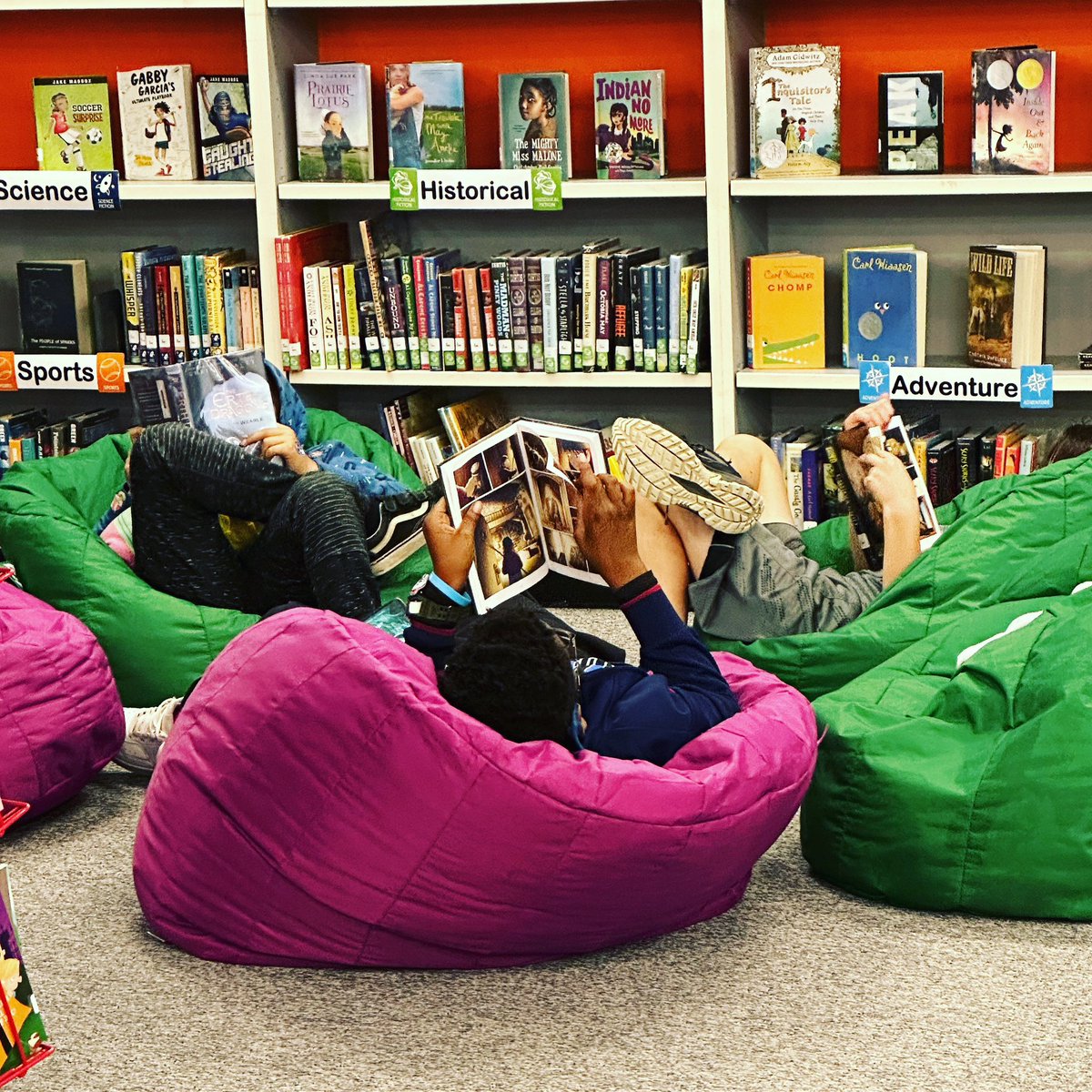 Reading and relaxing with a good book in the <a href="/ClubBlvdManatee/">Club Boulevard</a> library! 📚😌