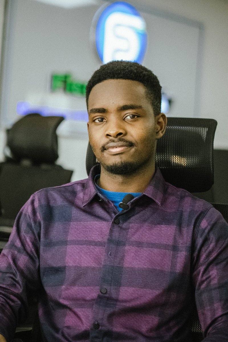 It's #WorkplaceWednesday, and we're all about innovation and dedication at Fleetsimplify. Aaron, our Mobile App Engineer, ensures that your ride-hailing experience is always top-notch. At Fleetsimplify, your journey matters