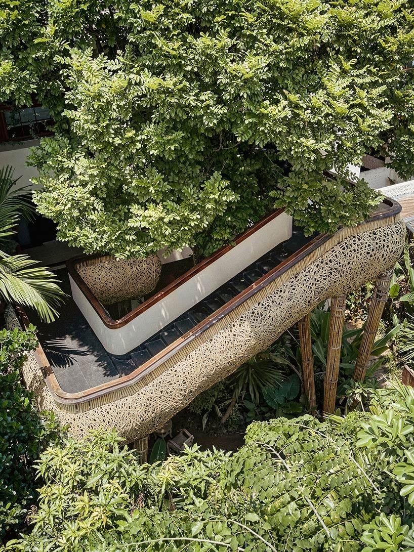 designboom's tweet photo. #weaved #bamboo wraps the floating promenades of spa and restaurant in china 🌿🎍 https://t.co/EQhtUtKnvR