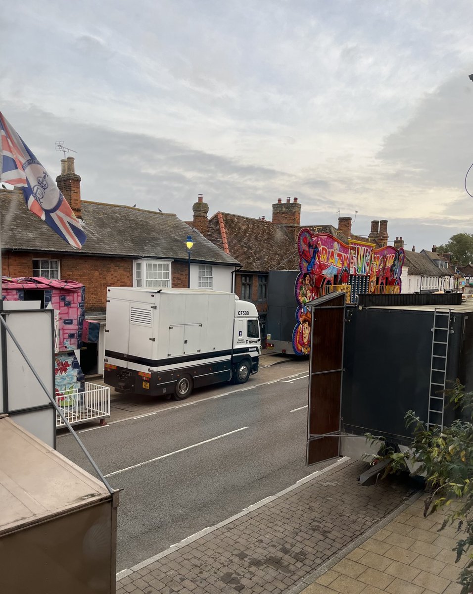Orcinus68's tweet photo. The view outside our window this morning. The annual Charter Fair has come to town. Held for one day only since the 1300’s. Always on 11th. It’s going to get noisy later &amp; the boy is already hiding behind the sofa 🙀 #charterfair https://t.co/5QReWQkkXC