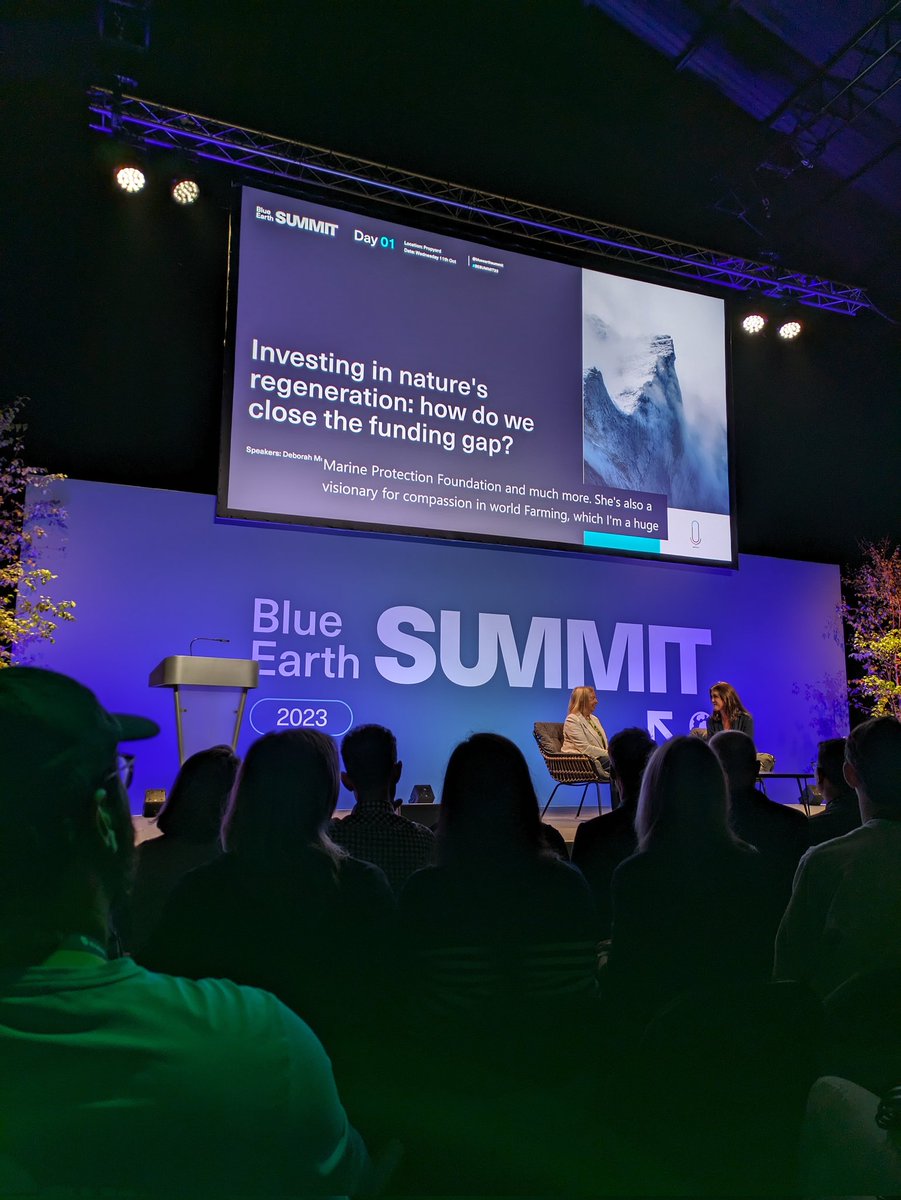 NatTrailsUK's tweet photo. Our Impact Fundraiser, Laura, is excited to be at @BlueEarthSummit meeting businesses doing better for nature, people and planet 🌎 She's also SO impressed that they have put live captions on the big screen. Laura has a profound hearing loss and this is a game changer! #EDIwin https://t.co/uRUZAZcuGI
