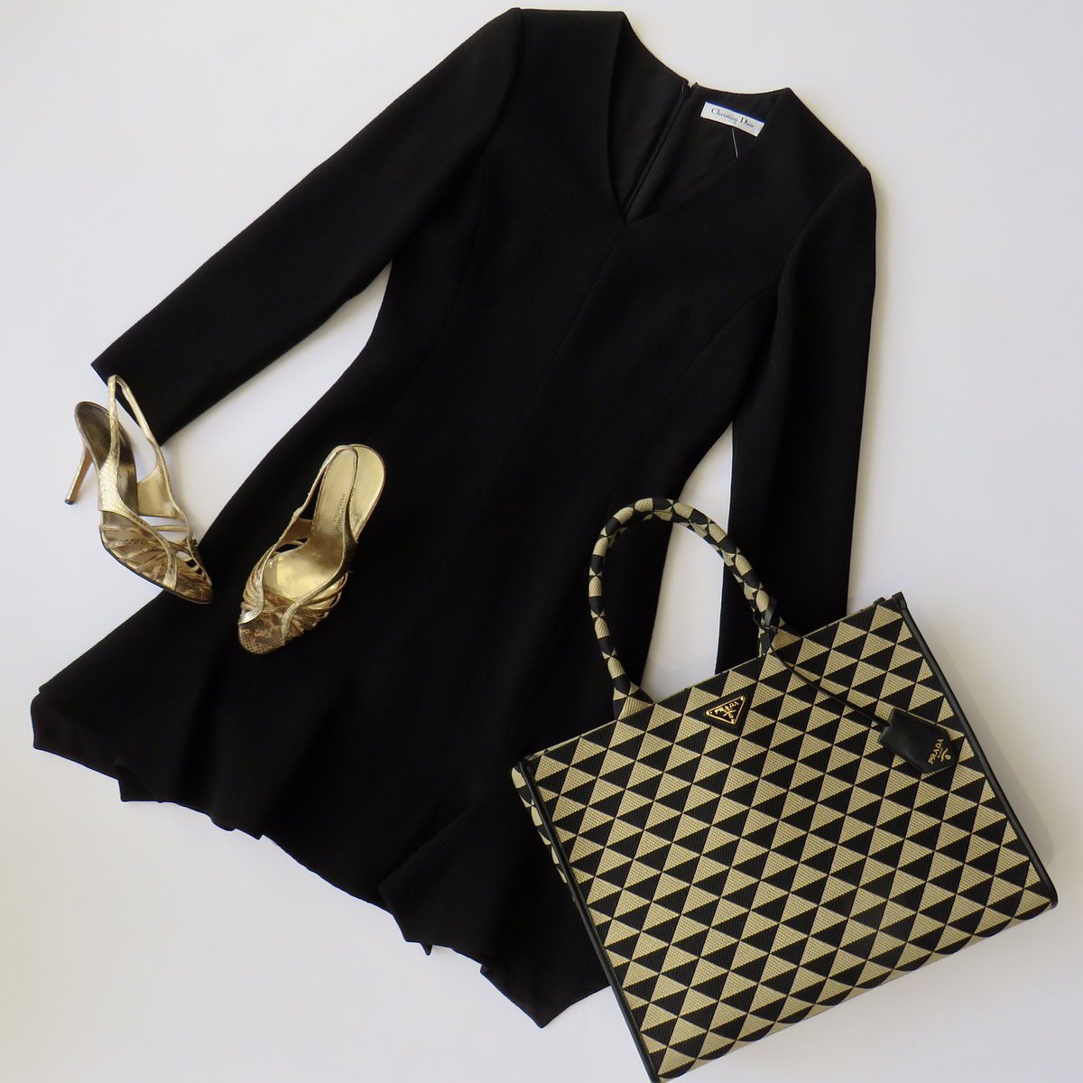 A perfect LBD! Paired with perfect Prada 🤩🖤 #ChristianDior black wool dress, £350, UK 10 🖤 #Dolce&Gabbana hold Python heels, £120, EUR 39.5 🖤 & #Prada Symbole embroidered tote, £1,500 (RRP £2,700) 🖤 #ootd #designerdressagency #shopStamford #luxuryforless #secondhandbutgrand