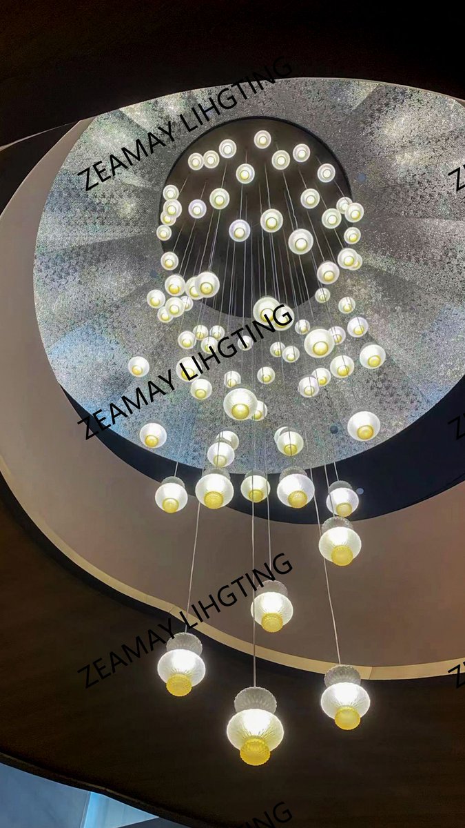 zeamaylighting's tweet photo. Customized hotel lobby crystal chandeliers, stainless steel bronze with hand-crafted transparent and amber art lampshades that perfectly complement each other. Contact WhatsApp/WeChat: +86 18922026808
#Zeamaylighting #customized #lightingfactory #hotelproject https://t.co/fDR1VZeZLL