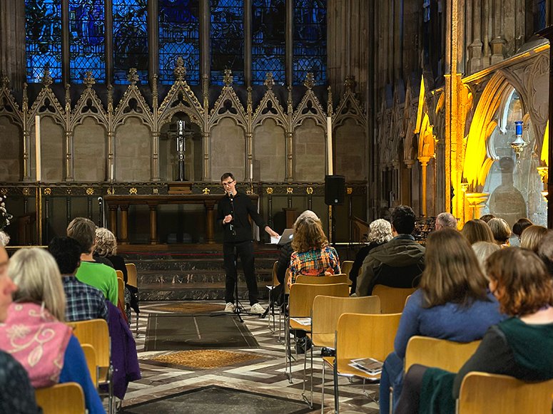 ExeterCathedral's tweet photo. We celebrated James Wilkes’ residency as our second #RiddlerinResidence with a poetry evening. We shared poems created by the local community inspired by #ExeterCathedral &amp; its ancient collections &amp; heard extracts from the Exeter Book read in Old English. @HeritageFundUK https://t.co/EaTWswVmg1