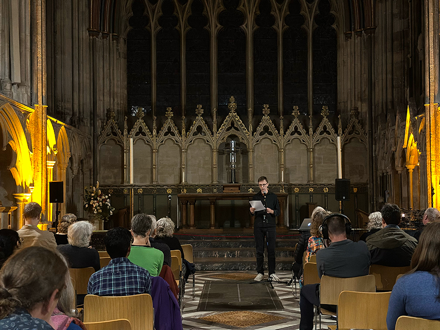 riddlerinexeter's tweet photo. We celebrated James Wilkes’ residency as our second #RiddlerinResidence with a poetry evening. We shared poems created by the local community inspired by #ExeterCathedral &amp; its ancient collections &amp; heard extracts from the Exeter Book read in Old English. @HeritageFundUK https://t.co/xRISHisYG0