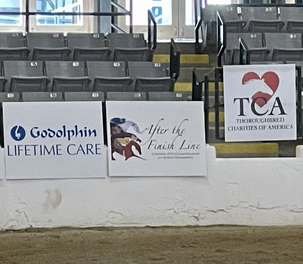 AfterFinishLine's tweet photo. Our signage looks great in the indoor arena at the @RRP_TBMakeover. 13 #Calbreds are competing for the $2500 Top-Placed California-Bred Award sponsored by the Georgia B. Ridder Foundation. Also reimbursing the trainer’s expenses. Visit our Facebook page to read about each #OTTB. https://t.co/qz7ENlHkMJ