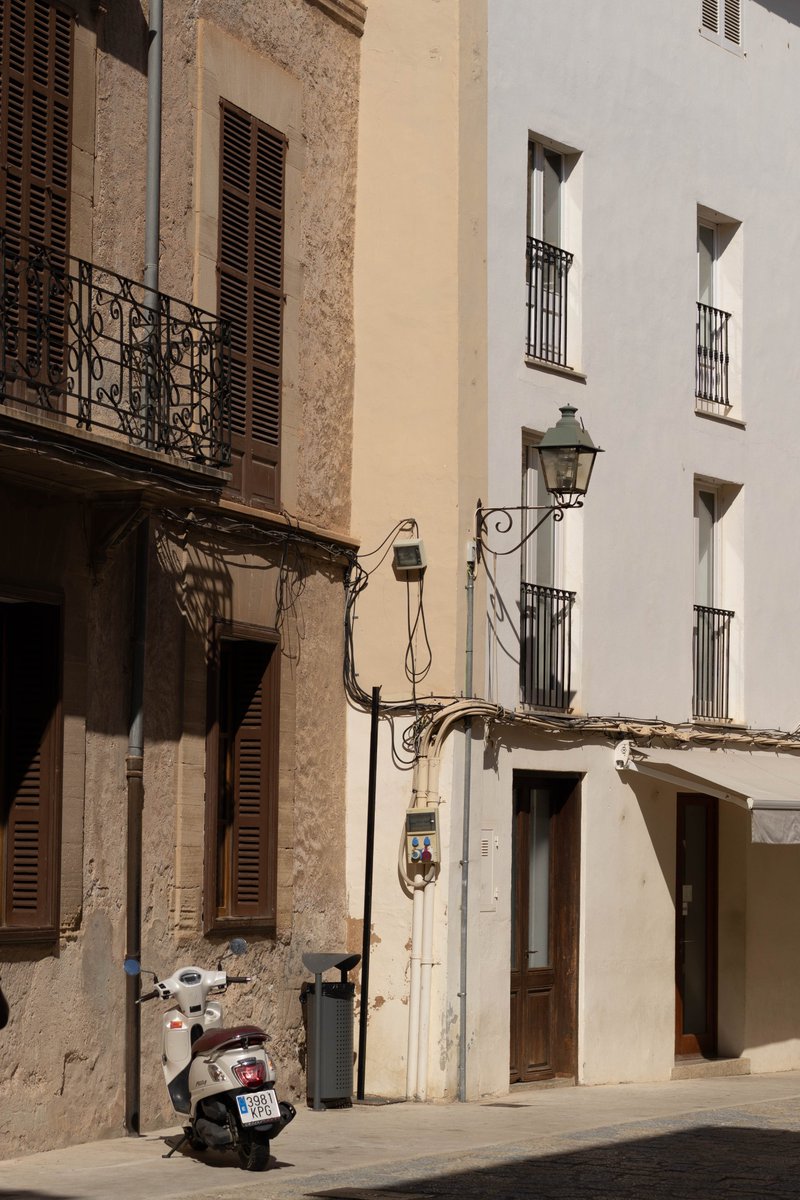 tzijlstra's tweet photo. A sunny afternoon in #Pollenca, Mallorca. Really idyllic place that is a dream for #streetphotography https://t.co/wXN6i3ABBh