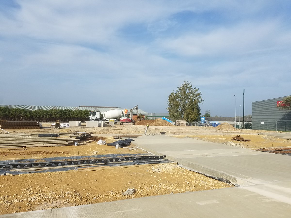 WARMFLAME DEVELOPMENTS ANGLIA WAY MOULTON PARK NORTHAMPTON Concrete yards taking shape yesterday, ahead of unit steel frames.