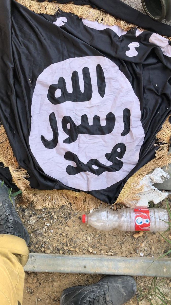 KatiePavlich's tweet image. South First Responders says guys combing through the destruction in southern Israel found this…an ISIS flag. 

“We spoke to soldiers who took part in the initial defense of the adjacent military post, who pulled this flag from the vests of one of the Hamas fighters.”
