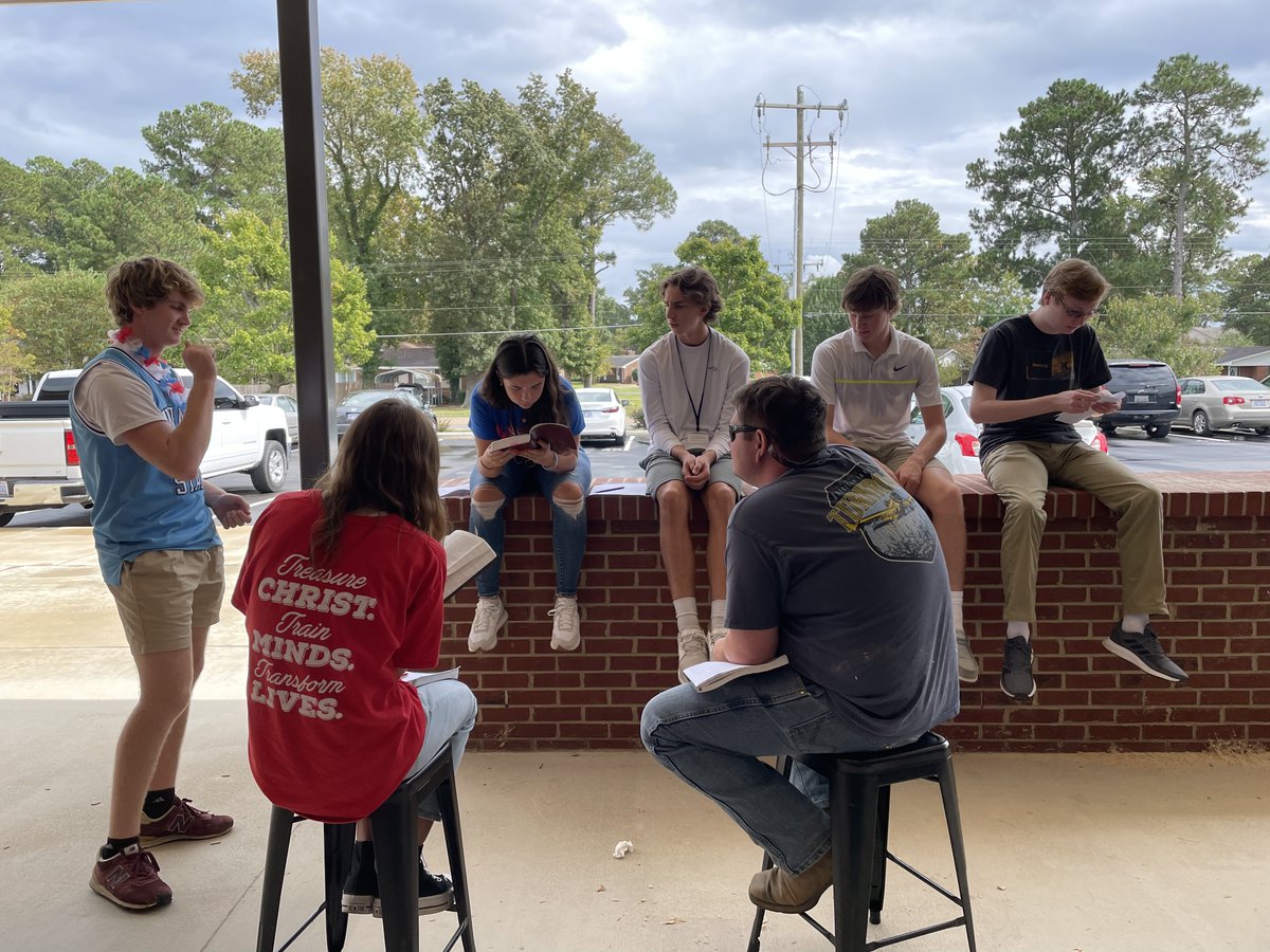 Economics honors students studying what the Bible says about debt. #reallifeskills #economics #wearewaynechristian