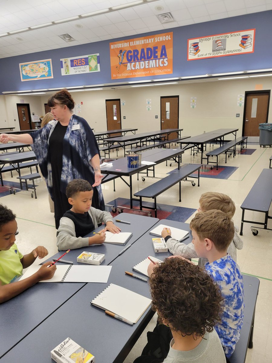 gccsadvanced's tweet photo. University of Evansville professor Valerie Milholland working with students on a book. Thanks #inartscomm. https://t.co/ia1RtnU3Sb