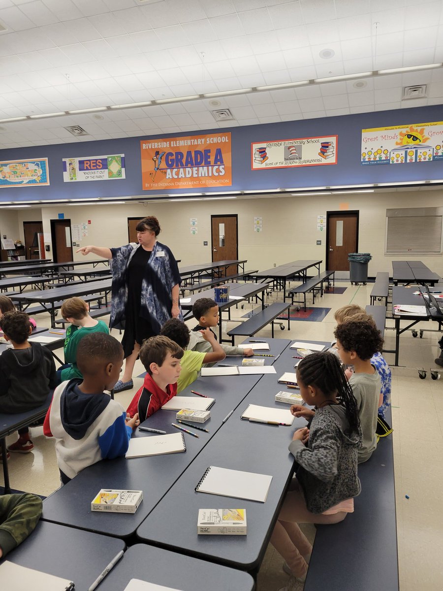 gccsadvanced's tweet photo. University of Evansville professor Valerie Milholland working with students on a book. Thanks #inartscomm. https://t.co/ia1RtnU3Sb